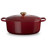 Cocotte ovale 31 cm Rouge Garnet bouton dore